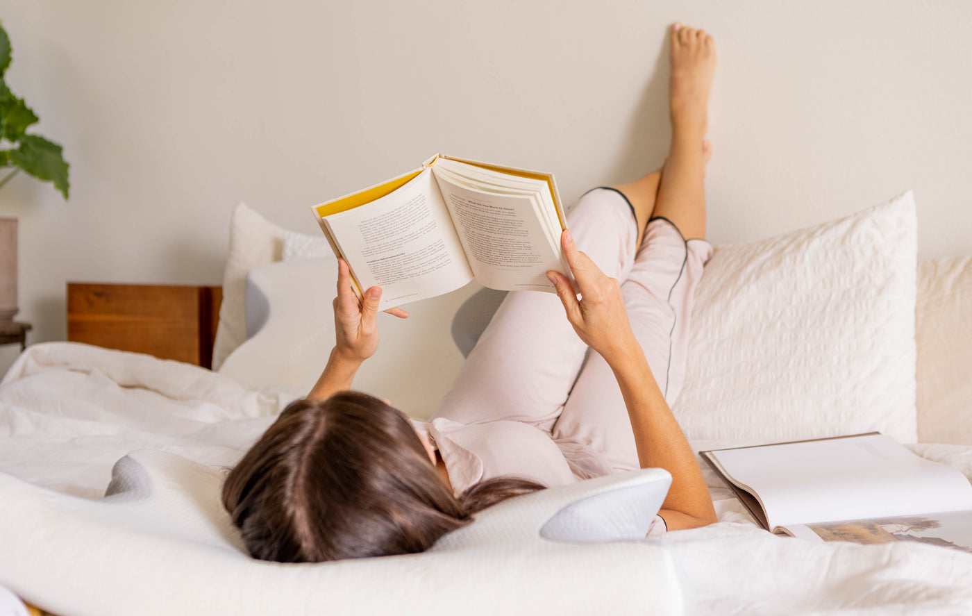 Couple sleeping comfortably with DreamRest pillows