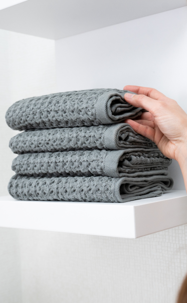 hands caressing silverthread towel